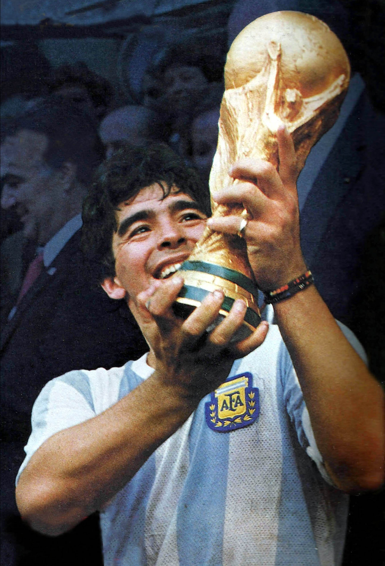 maradona holding the golden ball trophy