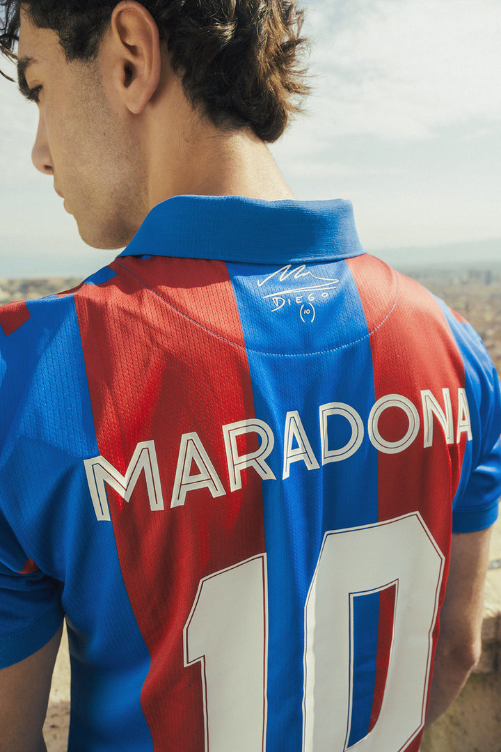 Person wearing a red and blue Barcelona jersey with 'Maradona' and number '10' on it.