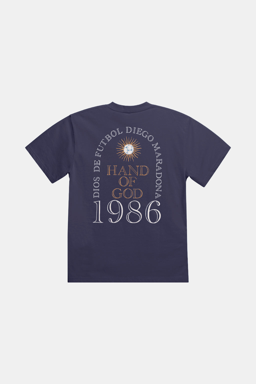 A navy blue short-sleeve t-shirt shown from the back, featuring a circular graphic print with a sunburst, the text 'DIOS DE FUTBOL DIEGO MARADONA', 'HAND OF GOD', and '1986' in white and gold.