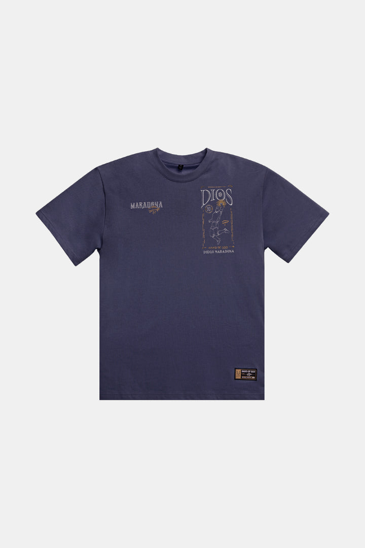A navy blue short-sleeve t-shirt with graphic prints on the chest, featuring 'MARAKUTHA' on the left chest and 'DIOS' on the right chest, along with a small brown brand patch near the bottom hem, displayed on a light gray background.