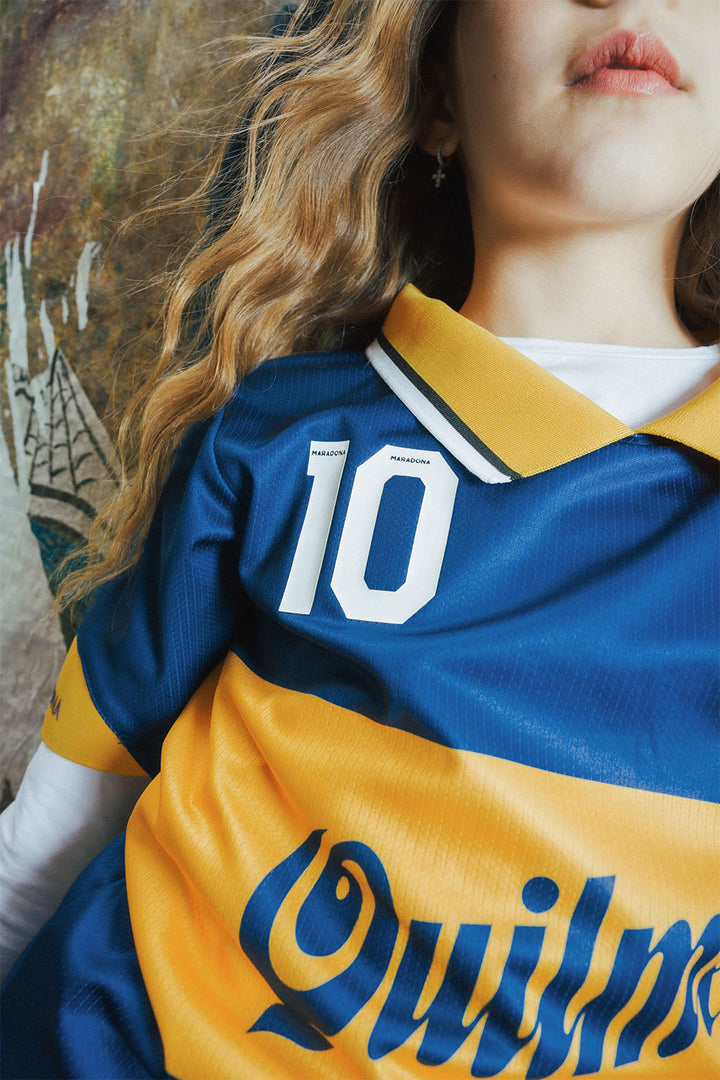 Close up of a Boca replica blue and yellow sports jersey with number '10'